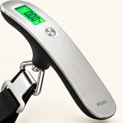 Close-up of the digital display and stainless-steel-look body of the ALTAIR luggage scale